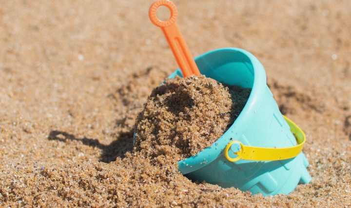 toy bucket in sand