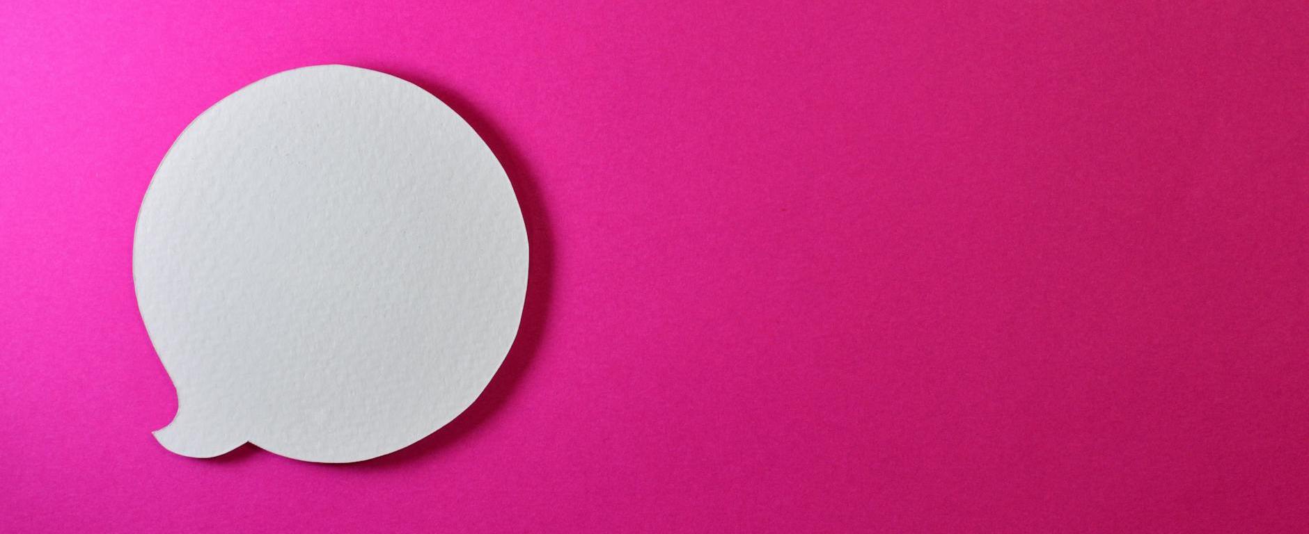 pink background with speech bubble